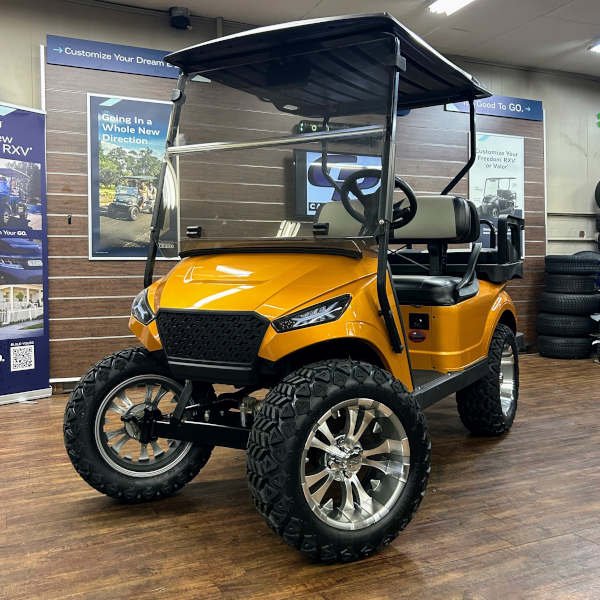2018 E-Z-GO TXT Lifted • Gas • Desert Gold Storm Body • Street-Ready and American-Built - For Sale at Larrysgolfcarts