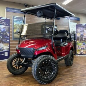 2018 E-Z-GO TXT Lifted • Gas • Cherry Metallic Storm Body • Street-Ready and American-Built - For Sale at Larrysgolfcarts