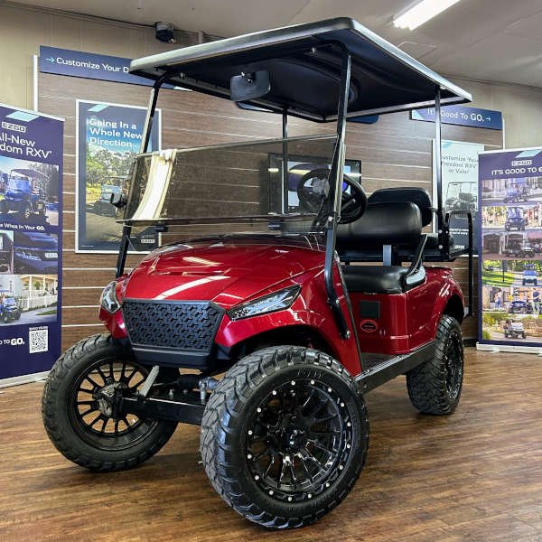 2018 E-Z-GO TXT Lifted • Gas • Cherry Metallic Storm Body • Street-Ready and American-Built - For Sale at Larrysgolfcarts