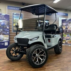 2018 E-Z-GO TXT Lifted • Gas • Cement Grey Storm Body • Street-Ready and American-Built - For Sale at Larrysgolfcarts